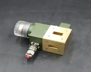 What are the key components of a waveguide electric switch?